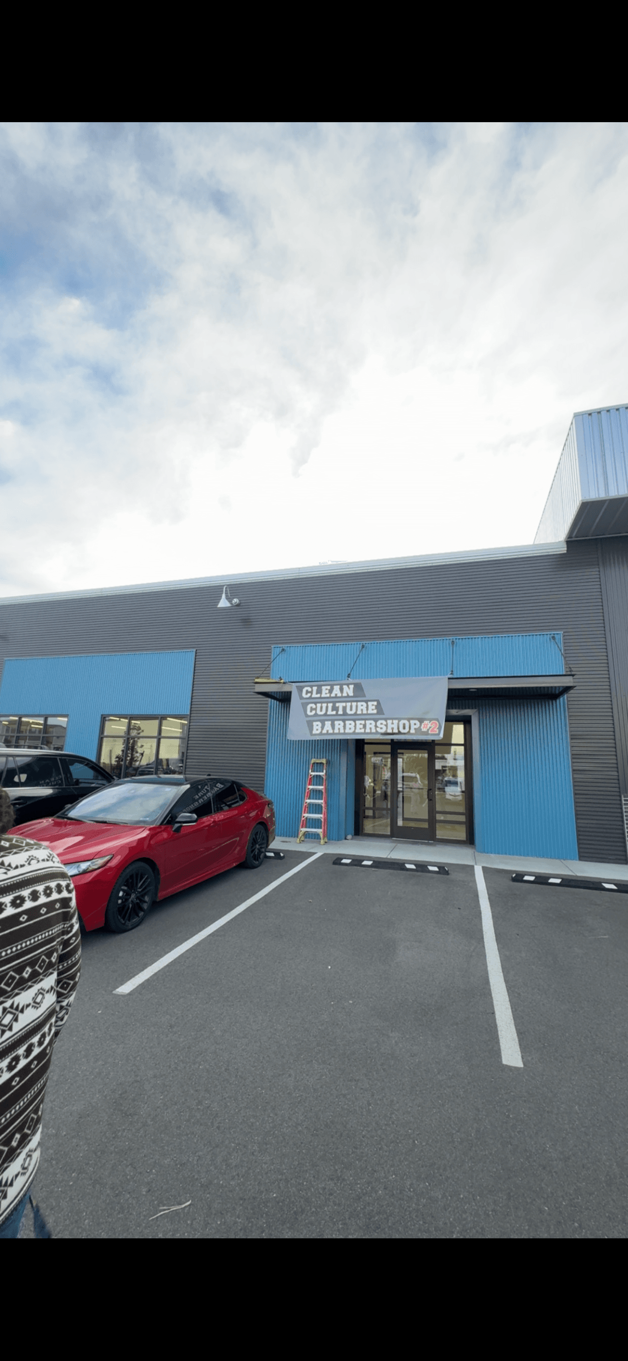 Front of the Clean Culture Barbershop #2 storefront in Pasco, WA — signage visible from the parking lot